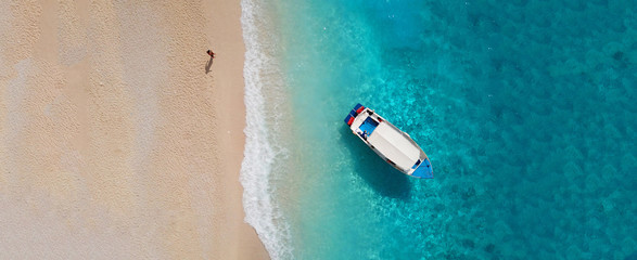 Aerial drone ultra wide photo of iconic shipwreck beach in island of Zakynthos, Ionian, Greece