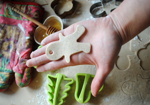 The process of making ginger cookies. Girl is preparing cookies. Gluten free from rice flour. Housewife makes christmas cookies. Close up close shot