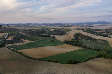 Fototapeta na wymiar Rural landscape of farms in Tuscany by Drone