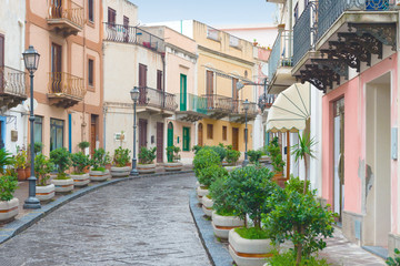 Fototapeta na wymiar a beautiful typical multicolored street in Lipari, Aeolian islands, Italy.