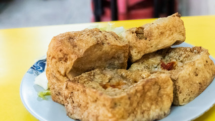 snack of stinky tofu on the table