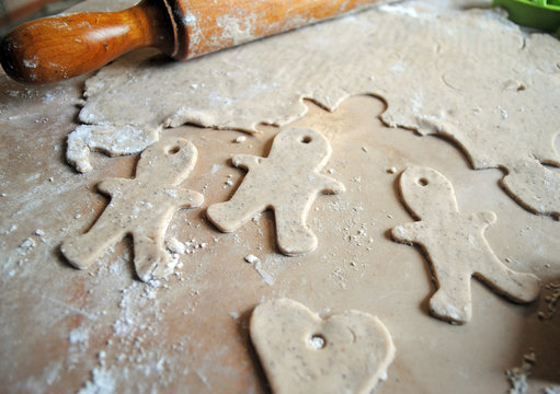 The process of making ginger cookies. Girl is preparing cookies. Gluten free from rice flour. Housewife makes christmas cookies. Close up close shot