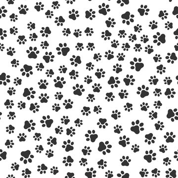 Seamless pet paw pattern background. Dog or cat paw wallpaper illustration footprint