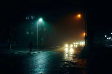  fog in the night city after rain, car headlights © Denys
