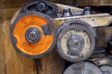 metal cog wheels in gearing at gear box