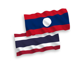 Flags of Laos and Thailand on a white background
