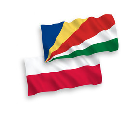 Flags of Seychelles and Poland on a white background