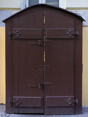 Wooden door with forged elements in high resolution