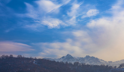 winter white clouds on blue sky background