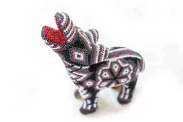 Traditional huichol zebra bead ornament figures mexican culture