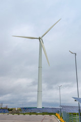 Renewable alternative clean wind energy produced by wind generators helps to preserve The earth's ecology. - 311619188