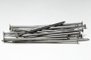 metal nails isolated on white backgrounds, Tools Construction Equipment Concepts
