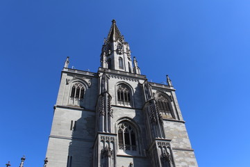 Historical Constance Cathedral (Konstanzer Muenster) isolated on blue sky in the city of Constance (Konstanz) in Baden-Wuerttemberg, Germany.