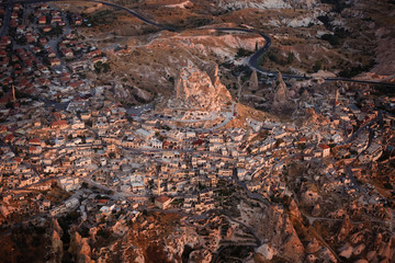 The fortress Urchisar Castle in Cappadocia located on the highest point in the region. Houses are built into the hillside. A major attraction the citadel is the largest and tallest fairy chimney.