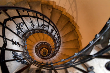 Old spiral staircase in the building in Budapest, Hungary