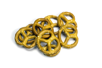 Crispy pretzels on white background. German beer snack. Close-up, isolate on white