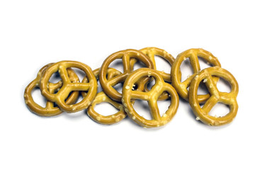 Crispy pretzels on white background. German beer snack. Close-up, isolate on white