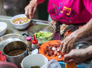 Street Vendor preparing Noodles