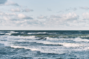 Fototapeta na wymiar Waves on the Baltic Sea. Storm at sea in winter