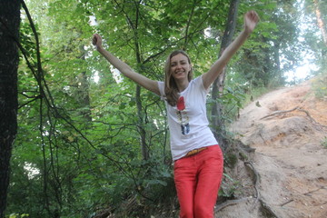 Girl in red pants in the Park