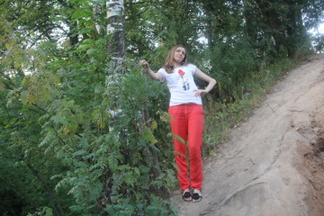 Girl in red pants in the Park