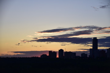 Fototapeta na wymiar sunset over city silhouette