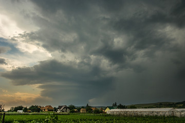 Fototapeta na wymiar Rotating thunderstorm, also known as a supercell, in Transylvania, Romania