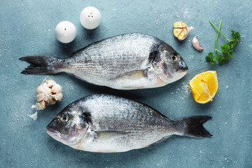Fresh dorado fish with ingredients
