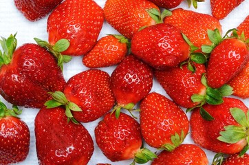 juicy ripe red strawberries on a white background
