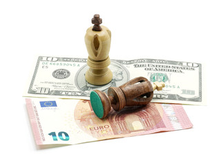 Trade Concept: King Chess Pieces On US Dollar And Euro Banknotes, Isolated On White Background, USA winning
