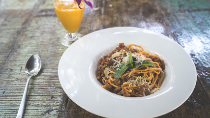 A dish of the Bolognese paste in a big white plate.