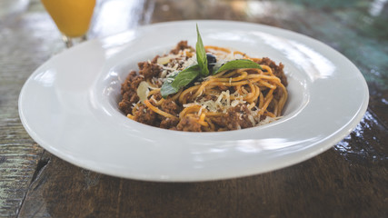 A dish of the Bolognese paste in a big white plate.