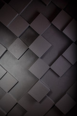 Dark squares abstract background. Realistic wall of cubes. Abstract cubes. Grey background. Geometric polygons, as tile wall