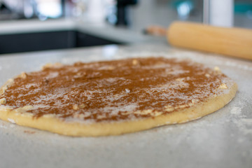 rolling cinnamon roll dough 