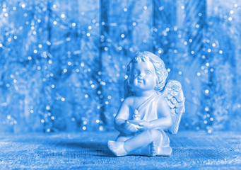 Blue Christmas decoration Little guardian angel lights background