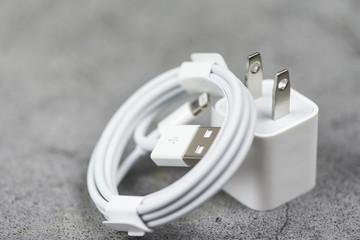 Electrical adapter smartphone usb port charger wire on gray background - Mobile Phone Charger...