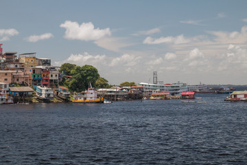 Fototapeta premium Colorful boats and houses, Manaus, Brazil, South America