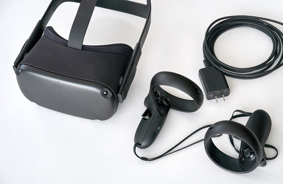Oculus Quest VR virtual reality headset and controllers by Facebook