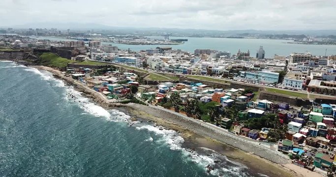 San Juan, Puerto Rico, Vivid La Perla Neighborhood, Aerial Revealing View on Castillo San Cristobal Fortress and Atlantic Ocean
