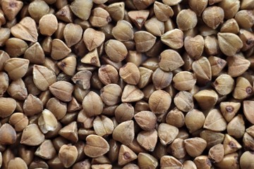 Brown buckwheat groats in bulk.