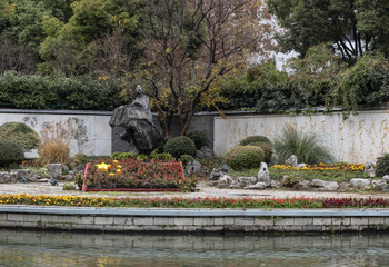 Bronze sculpture of Li Bai, greatest poet in Tang Dynasty, in a garden by Qinhuai River with his...