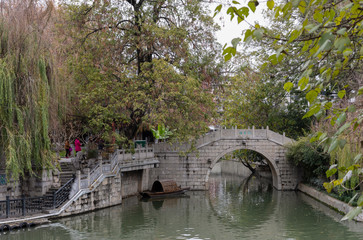 Fototapeta na wymiar Historical Taoye or Peach Leave Bridge of traditional Chinese style at Taoye Ferry Qinhuai, Nanjing, Jiangsu, China.