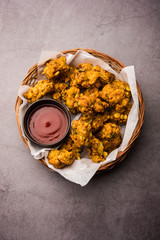 Crispy Corn pakora/pakoda, bhajji, Bhaji, bajji or pattice . served with tomato ketchup