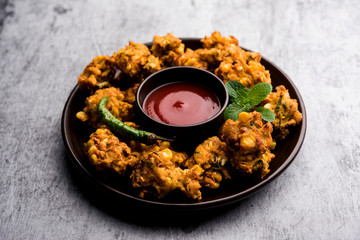 Crispy Corn pakora/pakoda, bhajji, Bhaji, bajji or pattice . served with tomato ketchup
