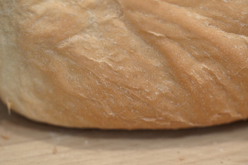 The homemade fresh baked bread loaf.