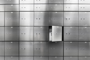 Metal safe box panel wall with open one. Concept for sucurity and banking protection. - obrazy, fototapety, plakaty