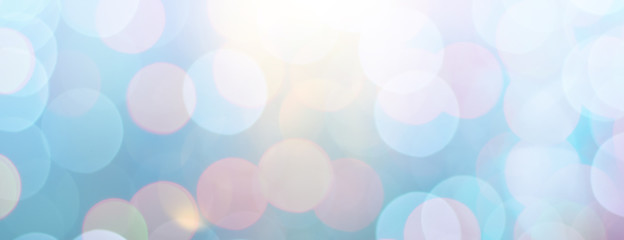 abstract blue background with bokeh lights and sunlight, panoramic background