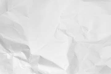 White crumpled paper texture background.