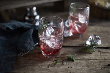 Grape juice cocktail with rosemary. .