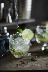 lemonade in glass with rosemary. .